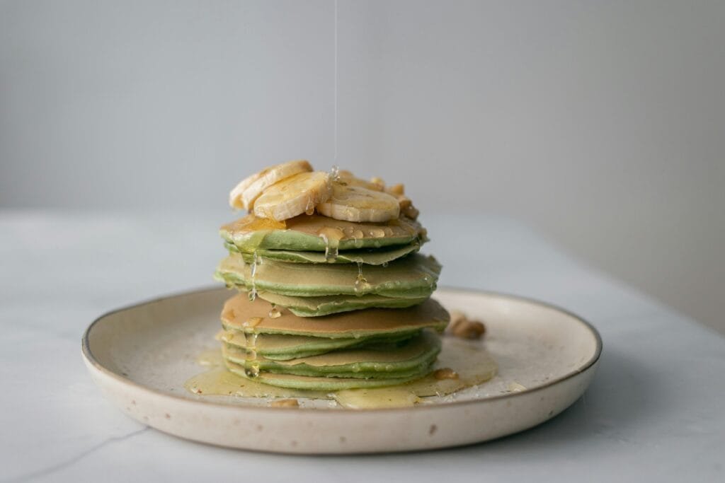 Unlock a Healthier You with This Easy Sugar Free Meal Plan 4 Stack of sugar-free pancakes topped with banana and syrup