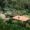 Lush jungle resort in Costa Rica featuring natural hot spring pools and tropical landscaping.
