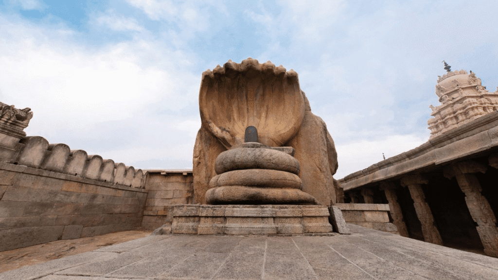 Ancient stone Nandi and Shiva Lingam at Lepakshi Temple, Andhra Pradesh.
