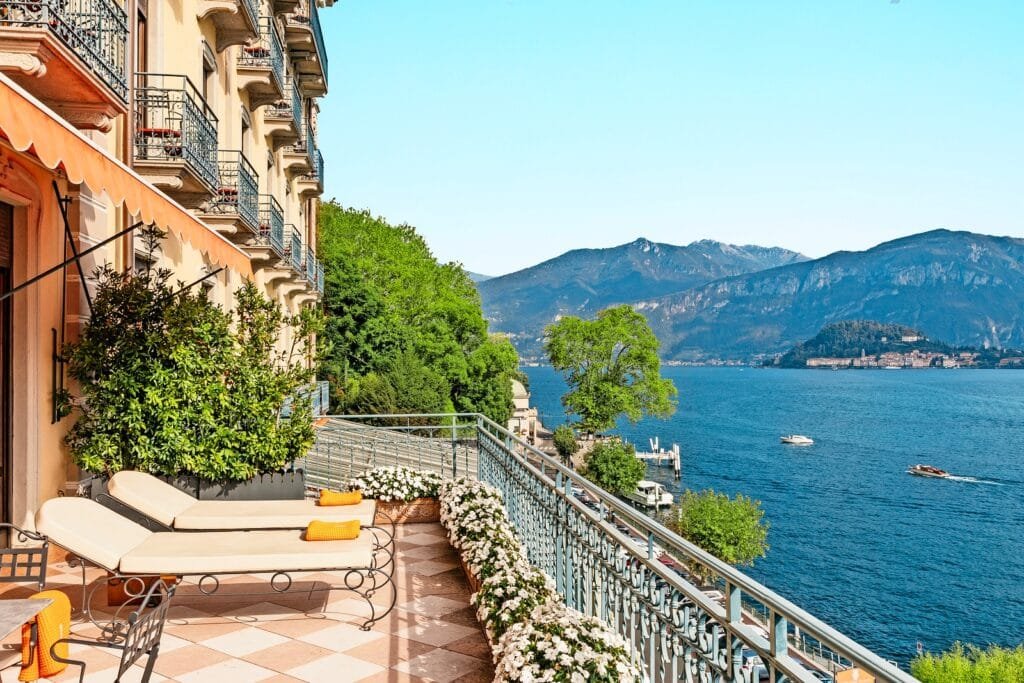 Balcony with lake and mountain views at a luxury stay near Cinque Terre hotels