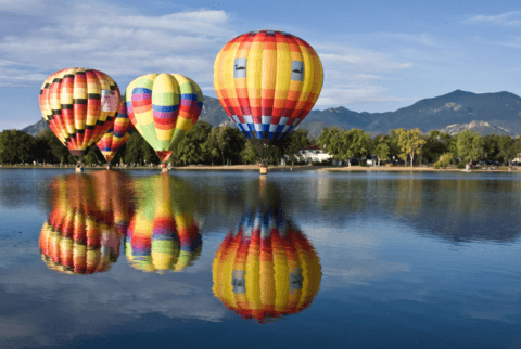 Scenic view of Colorado Springs with mountains and attractions