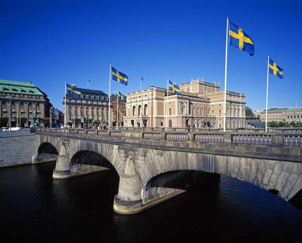 Stockholm bridge with Swedish flags